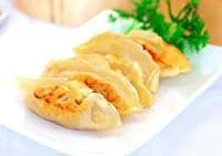 Dumpling   · Chicken and vegetables in dumpling wrappers served with soy-vinegar dipping sauce, available...