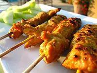Grilled Satay Chicken    · Spicy. Grilled Thai style chicken marinated in special spices, on skewers, served with a pea...