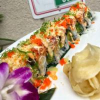 Arirang Super Roll · Shrimp tempura wrapped in spicy tuna.