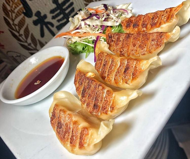 Pan-Fried Dumplings · Mouthwatering, soft, pan-fried shrimp dumplings with traditional dipping sauce.
