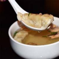 Gyoza Soup · Clear broth with dumplings.