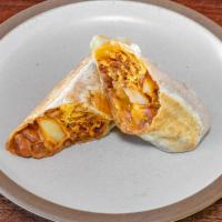 BREAKFAST BURRITO · Schreiner's Chorizo, Scrambled Eggs, Potato, Beans, Tillamook Cheddar
