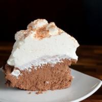 Mexican Chocolate Mousse Slice · Chocolate graham-cracker crust, spiced chocolate mousse, and fresh whipped cream.