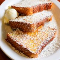 Hawaiian Sweet Bread French Toast · Three slices of Hawaiian sweet bread dipped in our homemade french toast batter