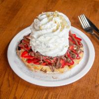 Fresh Strawberry Whipped Cream Waffle · Our Belgium waffle topped with fruit and powered sugar, topped with whip cream and macadamia...