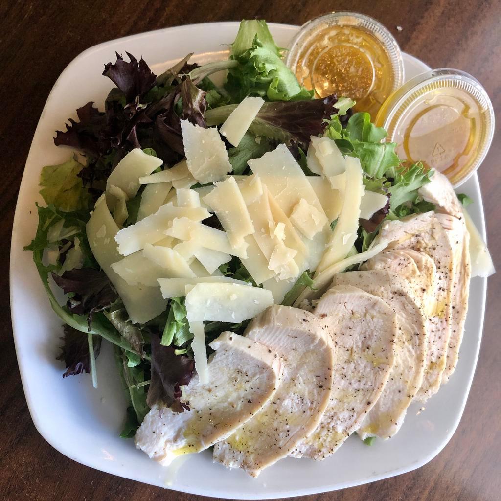 Cup or Bowl of Homemade Soup and Large Green Salad with Roasted Chicken · Mixed lettuces, fresh herbs, house red wine vinaigrette and shavings of Grana Padano with roasted chicken breast. Check social media or call for daily soup options! 