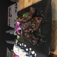 Teriyaki beef · Served with Brown or white rice and sesame salad