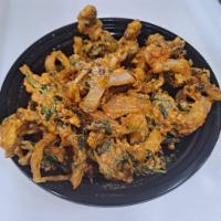 Vegetable Pakora  · Vegetables and spices deep-fried in gram flour.