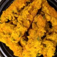 Paneer Pakora  · Cheese and spices deep-fried in gram flour.