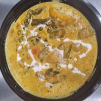 Vegetable Korma  · Seasoned vegetables cooked in a creamy sauce with almonds and coconut.
