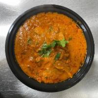 Chicken Curry  · Boneless chicken, onions, garlic, ginger, tomatoes and curry spices.