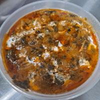 Chicken Saag  · Chicken cooked with spinach in seasoned herbs and spices.