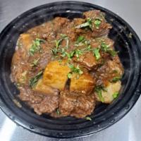 Lamb Vindaloo  · Lamb cooked with potatoes and a special spicy sauce.