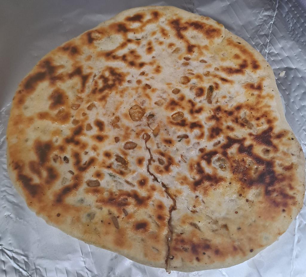Onion Kulcha · Fresh made - baked in our tandoori oven