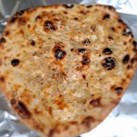 Rosemary Garlic Naan · Fresh made - baked in our tandoori oven