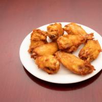 8. Eight Pieces Fried Chicken Wings · Cooked wing of a chicken coated in sauce or seasoning.