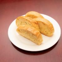 10. Four Pieces Garlic Breads · Buttery bread that is topped with garlic. 