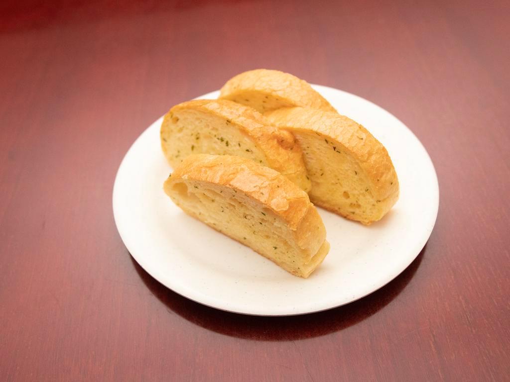 10. Four Pieces Garlic Breads · Buttery bread that is topped with garlic. 