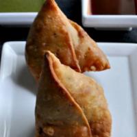 Samosa · Fried homemade street-food style pastry with savory filling such as potatoes, peas, lentils ...
