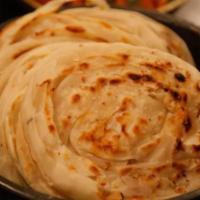 Paratha (2 Pcs) · Street-style layered flaky, crispy and crumbly (yet fluffy) flat bread