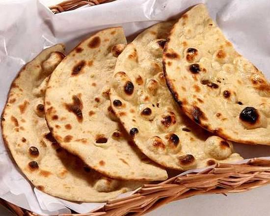 Tandoori Roti · Flat thin bread made from stone ground whole meal flour without pan and oil