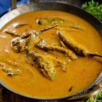 Salan · A spicy dish of vegetables flavored with curry powder