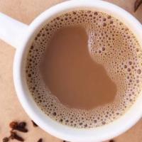 Madras Coffee · Authentic traditional Indian lter coffee made by mixing frothed and boiled milk with nely br...