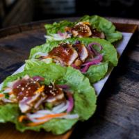 Ahi Tuna Wraps · Gently seared tuna, pickled vegetables, soy glaze, almonds and lettuce leaves