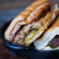 BC Press Sandwich · Barbecue pulled pork, ham, cheese, pickles and mustard.