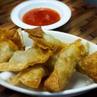 Pangsit Goreng · Deep-fried chicken wonton served with sweet and sour sauce.