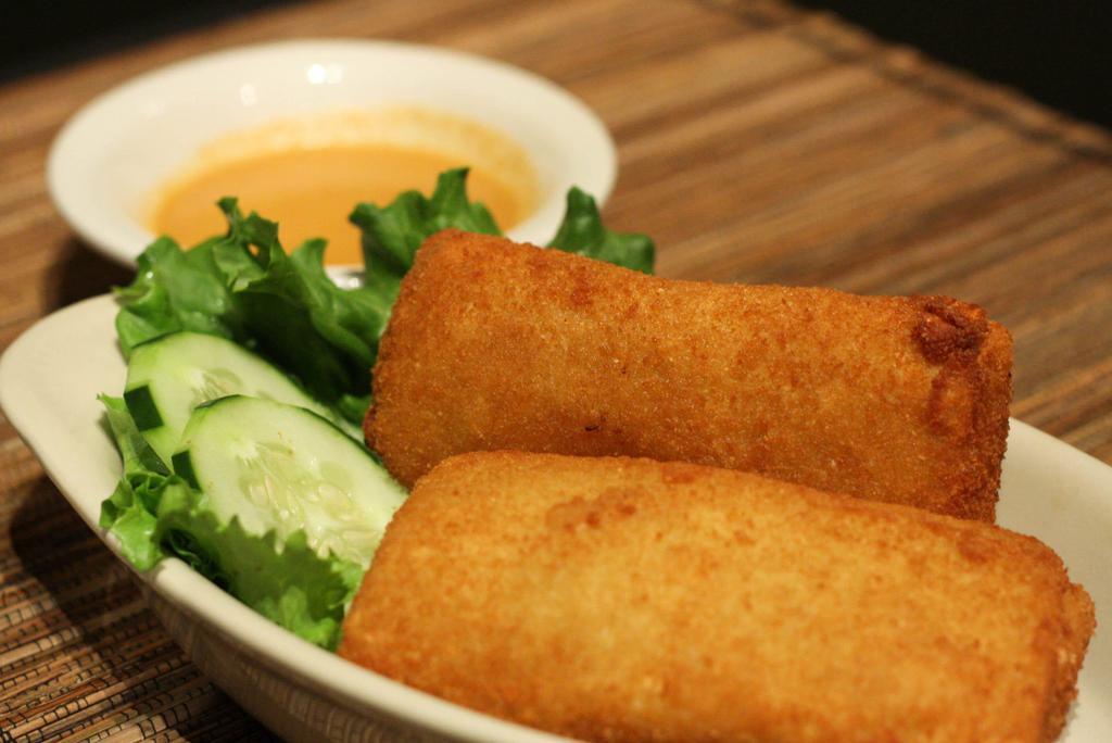 Risoles · Deep- fried dutch-indonesian breaded egg rolls stuffed with chicken ragout served with spicy peanut sauce.