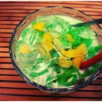 Es Cendol · Green rice gelatin with jackfruit in coconut milk and javanese brown sugar.