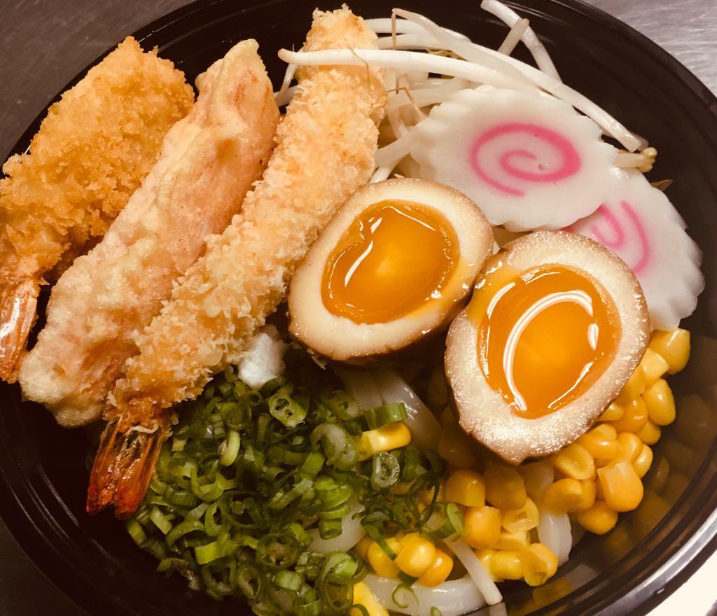 Udon Nooddle · clear broth udon noodle soup: deep fried shrimp and crabmeat, fish cake, bean sprouts, chopped scallion, sweet corn and a boil egg