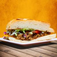 ChoiceTorta · Mexican bread, choice of vegan meat, mayo, lettuce, tomatoes, onions, cheese and jalapenos.