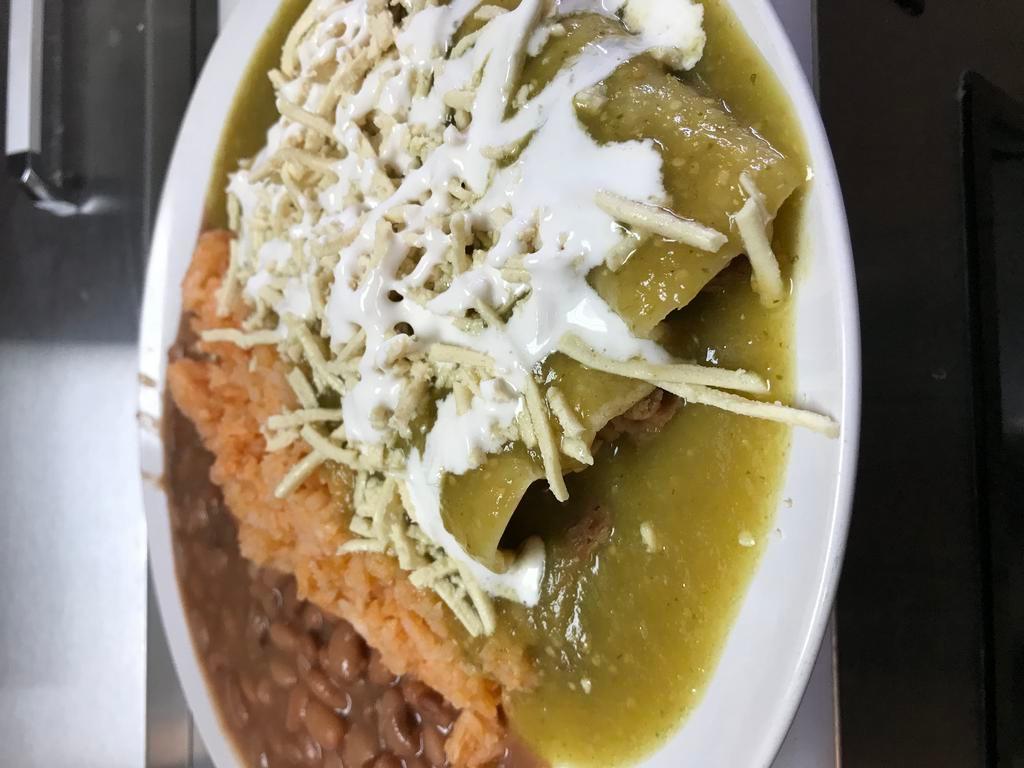 3 Green Enchiladas · Choice of vegan meat, onion, cilantro, choice of salsa. Served with rice and beans.