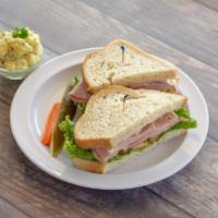 Ham Cold Sandwich · Black forest ham with lettuce, tomato slices and mayo.