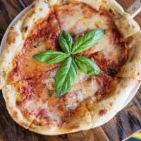 Margherita Pie · Organic tomato sauce, fresh mozzarella, basil, and sea salt.