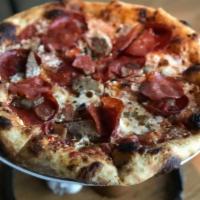 Salami Pie · Calabrese salami, house fennel sausage, Biellese pepperoni, bacon, Calabrian peppers, organi...