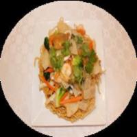 I2. Mi Xao Gion · Crispy chow mein. Choice of meat pan fried with carrot onion and broccoli.