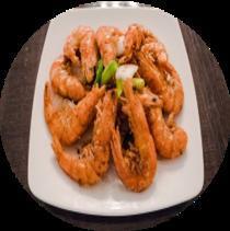 L3. Tom Rang Muoi · Salt and pepper shrimp. Deep fried shrimp with onion and pepper.