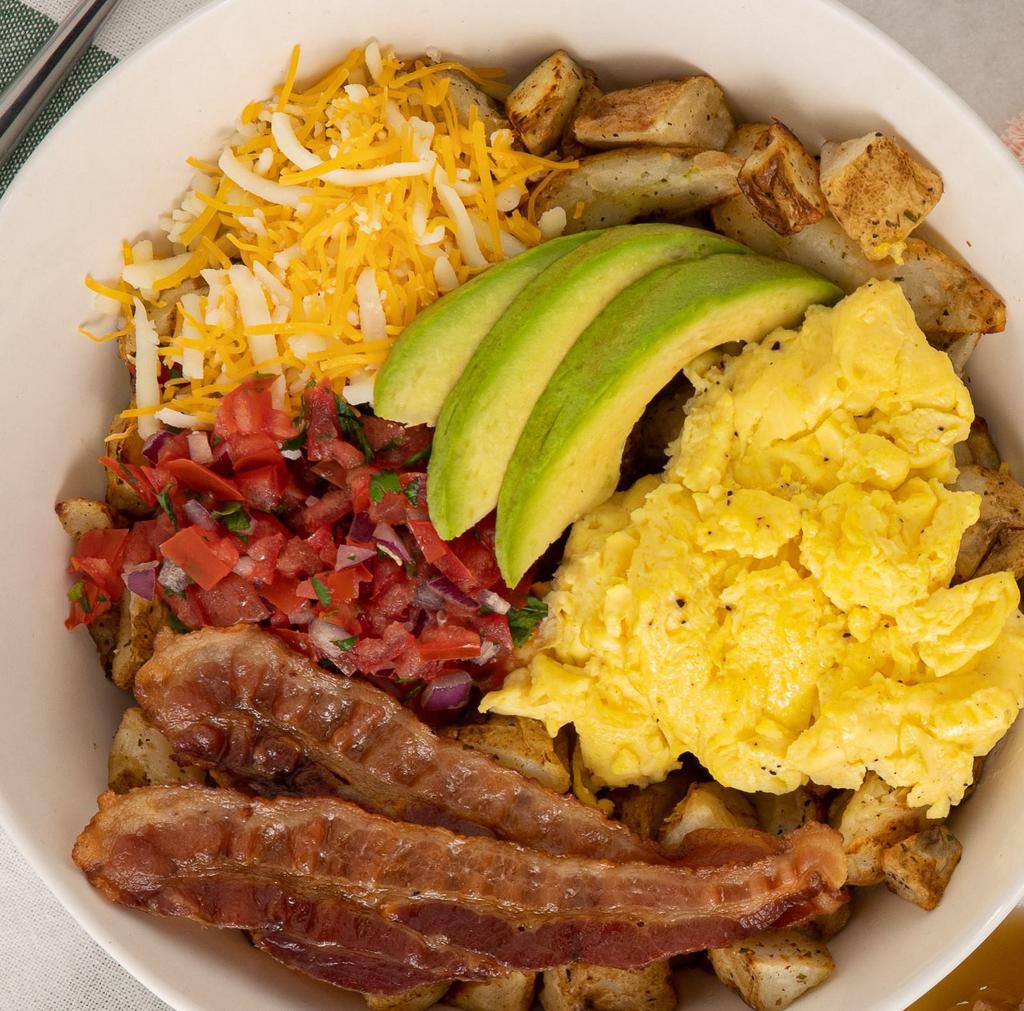 Southwest Bowl · Roasted potatoes, fluffy scrambled eggs, Pico de Gallo, avocado, shredded cheese and your choice of breakfast meat.
