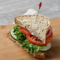 Veggie Sandwich · Served with provolone on 9 grain bread.