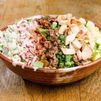 Cobb Salad · Romaine, chicken breast, bleu cheese, bacon, candied pecans, apple, radish, scallions, cranb...