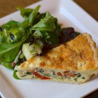 Mediterranean Quiche · Spinach, Goat cheese, sun-dried, tomato, mushroom, with a side salad. Vegetarian.