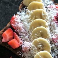 - Kids Strawberry Banana Hazelnut Toast · One slice of toasted sprouted wheat bread with hazelnut spread, strawberry, banana, and coco...