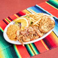 Langostinos estilo Nayarit · Prawns dipped in a house special mild or hot sauce served with rice, salad and french fries.