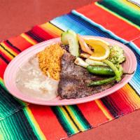 Carne Asada · Charbroiled inner skirt steak. Rice, beans, salad, guacamole, grilled onions and jalapeno, h...