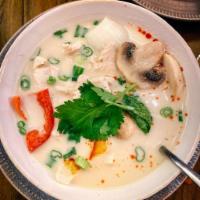 Tom Kha Soup · Chicken or vegetables. Recommended with chicken. Aromatic herbs, mildly spiced, coconut milk...