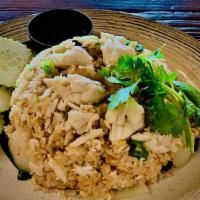 Thai Crabmeat Fried Rice · Fried rice, jumbo lump crabmeat, garlic, egg, scallion, cilantro, onion.