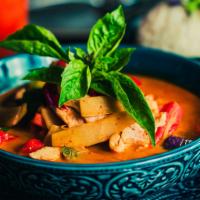 Red Curry · Red curry paste, bamboo shoot, eggplant, carrot, bell pepper, basil, coconut milk served wit...
